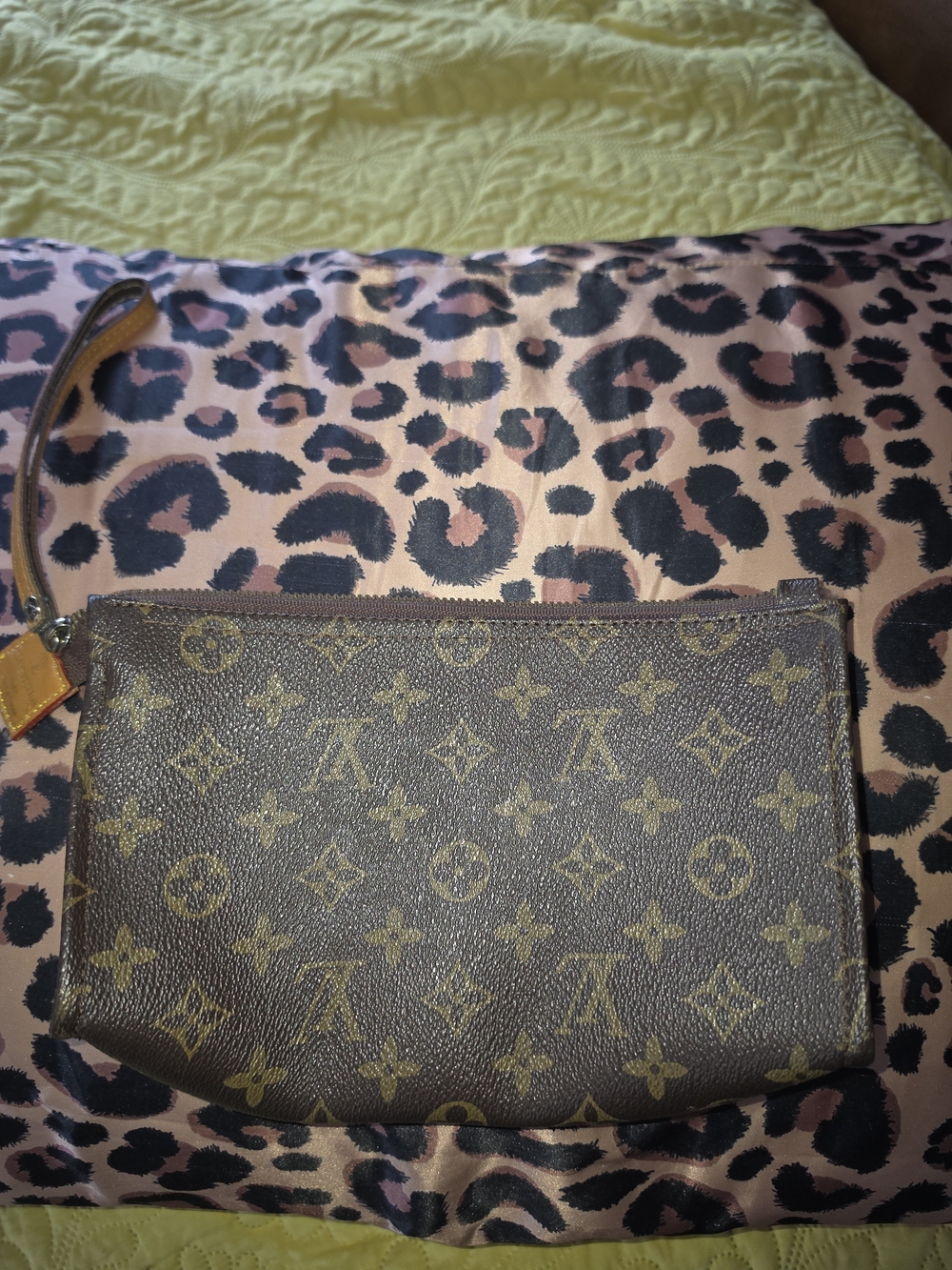 Louis Vuitton Monogram Wristlet Pouch in Brown